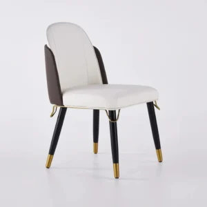 Three-quarter view showing white seat, mocha backrest, and subtle gold trim on a plain background.