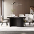 Six-seater marble-top dining table styled in modern room.