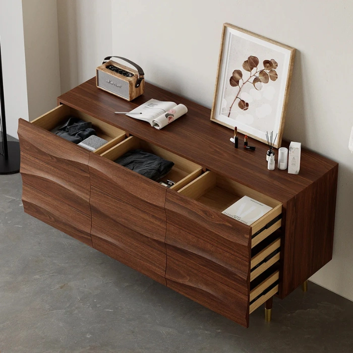 Nordic Haven Dresser – top angled view of dresser with wave-textured drawers partially open, showing spacious storage.