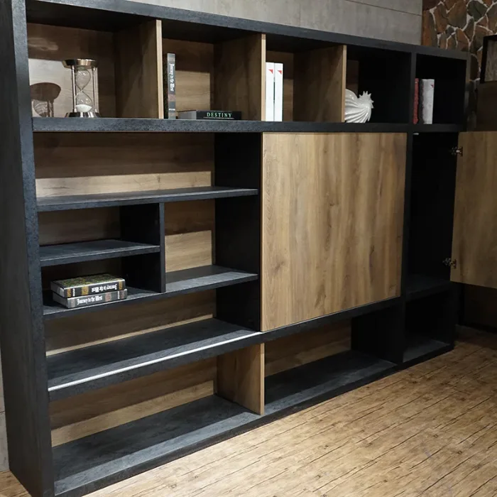 Oak Back Wall storage unit with offset shelves, sliding door, and contrasting charcoal edging.