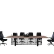 Front view of Oak Boardroom Table with surrounding chairs for scale