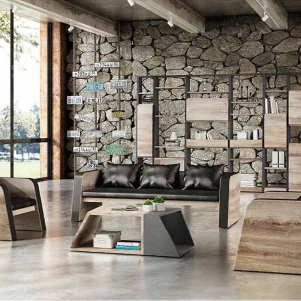 Industrial-style office lounge scene with wood-grain sided 3-seater sofa and black cushions, paired with geometric coffee table and shelving in the background.