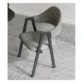 stylish grey upholstered chair with black wooden frame