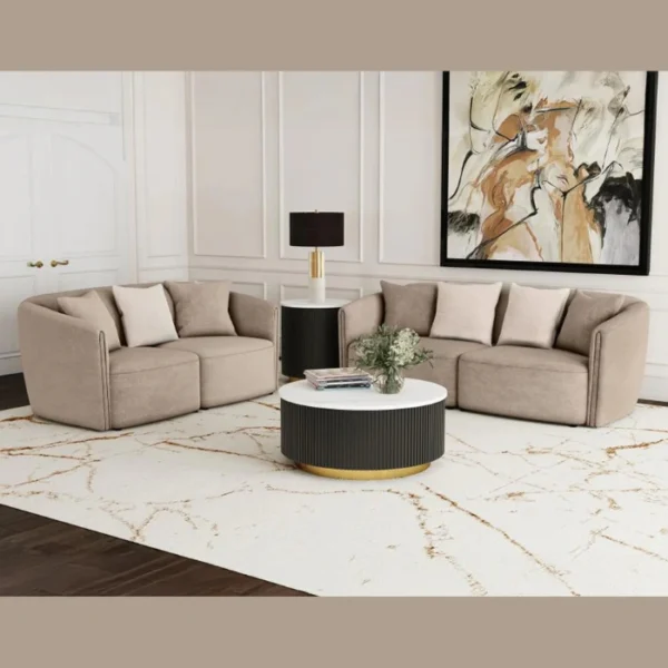 Plush Living room set (2) Two curved loveseats arranged in an L-shape around a black-and-gold round coffee table in a bright living room.
