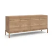Roco Dresser – angled view of light oak dresser featuring six drawers and brass knobs, showcasing its sleek, modern wooden design.