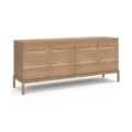 Roco Dresser – angled view of light oak dresser featuring six drawers and brass knobs, showcasing its sleek, modern wooden design.
