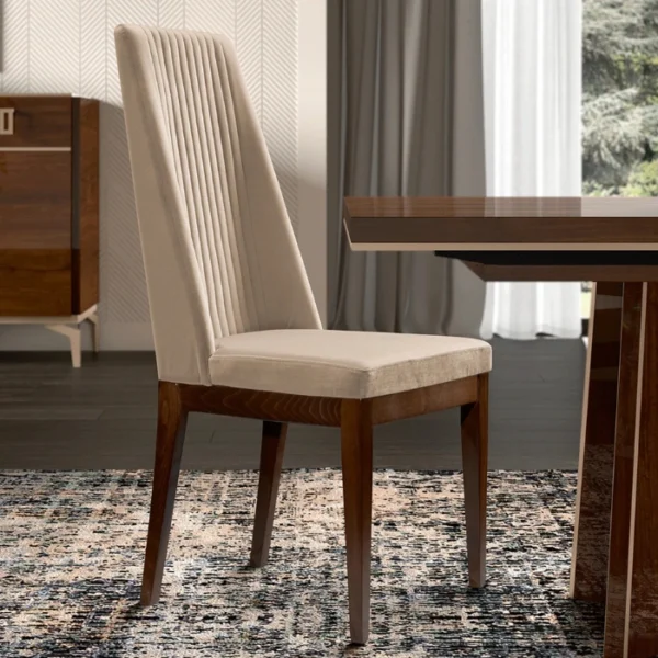 Veneer Dining Chair (3) Beige upholstered high-back dining chair beside a veneered table in a modern room.