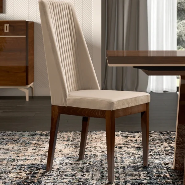 Veneer Dining Set - chair (2) Beige upholstered high-back dining chair beside a veneered table in a modern room.