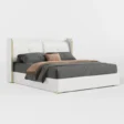 angled view of white upholstered bed in a white background.
