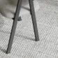dining chair showing black thin wooden legs
