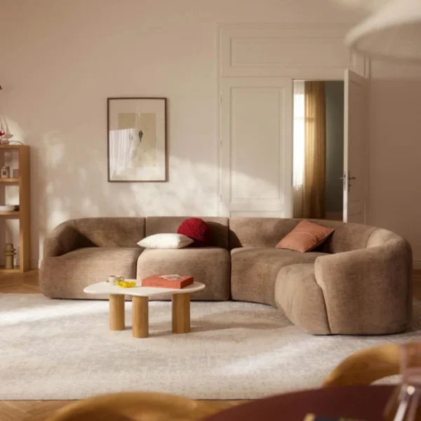 Oro cloud Sectional sofa - 4 seater (Light Brown) Light brown Oro Cloud Sectional Sofa in a modern living room with curved design.