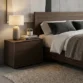 Oslo Side Table – front view of brown wooden side table featuring two drawers with a smooth, modern finish.