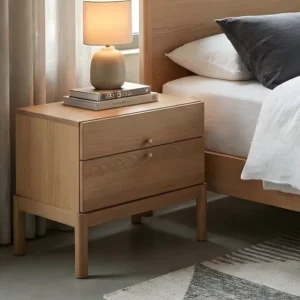 Roco Side Table – modern light oak side table with two drawers and brass knobs, featuring a clean and minimal design.