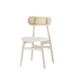 rattan cane back dining chair in whitewash color with faux leather upholstery