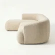 Side profile view of beige modular sofa
