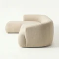 Side profile view of beige modular sofa