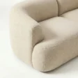 armrest close view of beige sofa