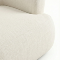 close view of seat showing soft upholstery of white modular sofa