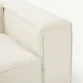 close view of armrest of white modular sofa