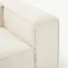close view of armrest of white modular sofa