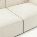 close view of seat showing premium white upholstery of white modular sofa