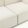 close view of seat showing premium white upholstery of white modular sofa