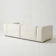 angled back view of white modular sofa
