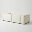 angled back view of white modular sofa