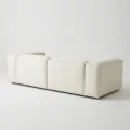 angled back view of white modular sofa