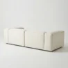 angled back view of white modular sofa