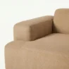 armrest close view of brwn modular sofa
