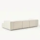 angled back view of white modular sofa