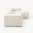 side profile view of white modular sofa
