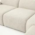close view of seat showing premium upholstery of white sofa
