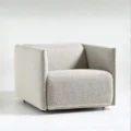 angled view of off white upholstered chair