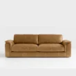 front view of bruno curve sofa in brown upholstery