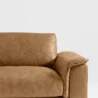 close view of armrest showing leatherite upholstery