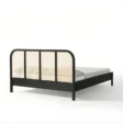 reaer view of black cane bed