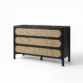 angled view of black cane dresser