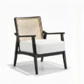 angled view of cane armchair.