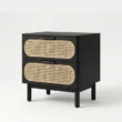 angled view of black cane side table