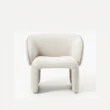 front view of white boucle armchair
