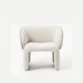 front view of white boucle armchair