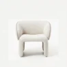 front view of white boucle armchair