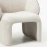 close view of white boucle armchair showing premium boucle fabric