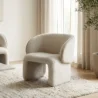 White boucle armchair in modern room
