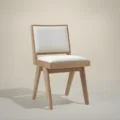 solid oak wood chair with off white upholstery in studio background