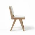 side profile view of beige chair.