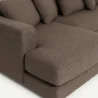 armrest and seat close view of brown sectional sofa