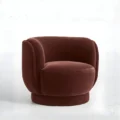 angled view of umber armchair in white background